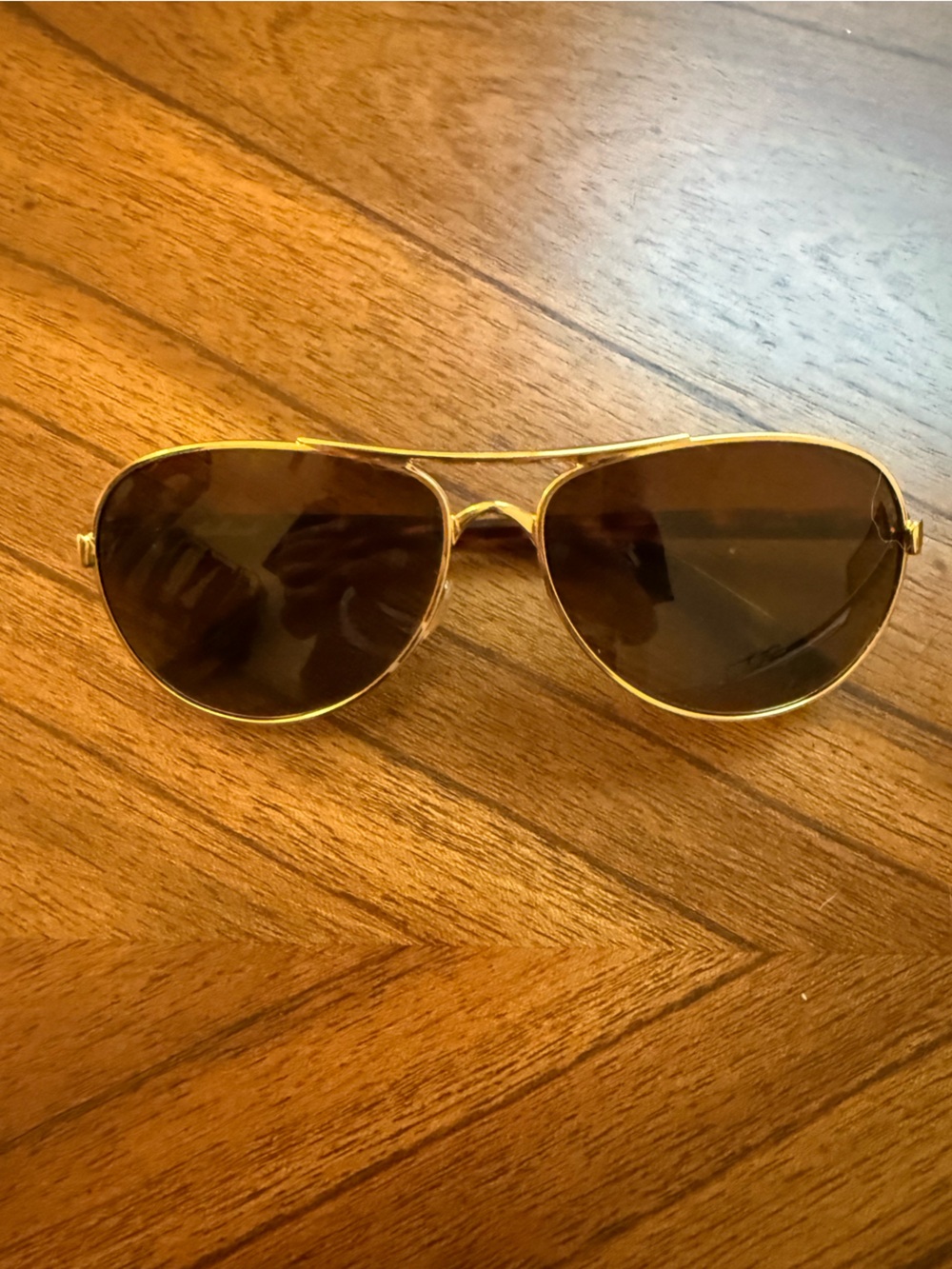 Oakley | Gold Frame Brown Lens Women's Sunglasses
